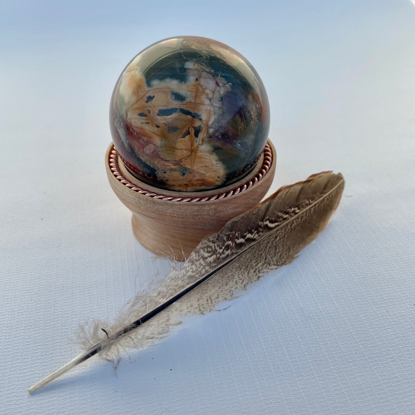 Red Creek Jasper Sphere with Tensor Ring Maple Wood Stand