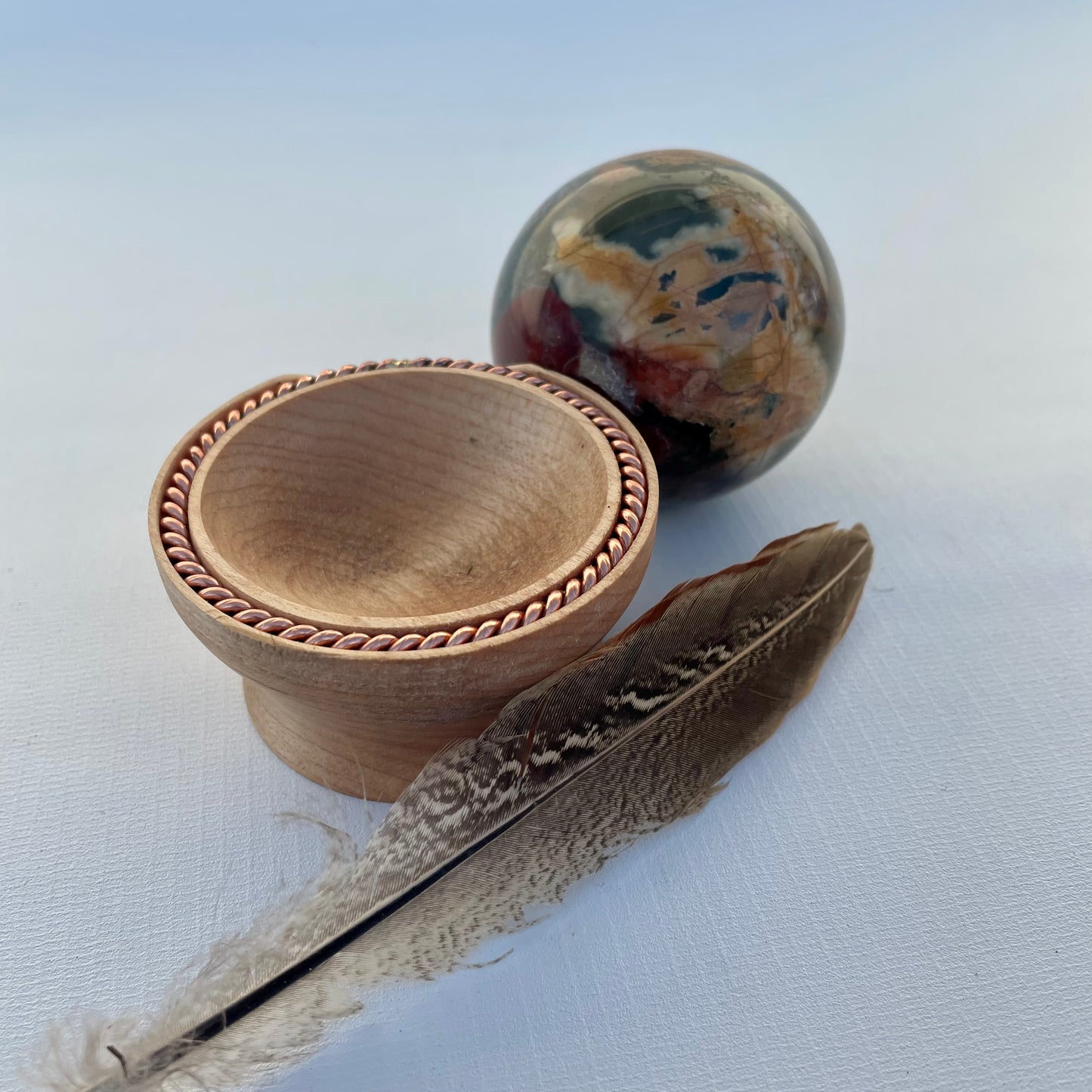 Red Creek Jasper Sphere with Tensor Ring Maple Wood Stand