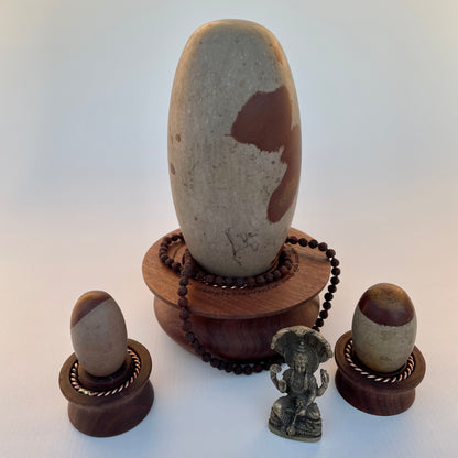 Shiva Lingam with Sacred Feminine Tensor Ring Yoni Stand