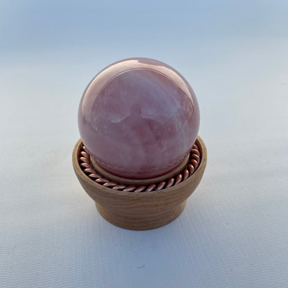 Rose Quartz Sphere with Tensor Ring Maple Wood Stand