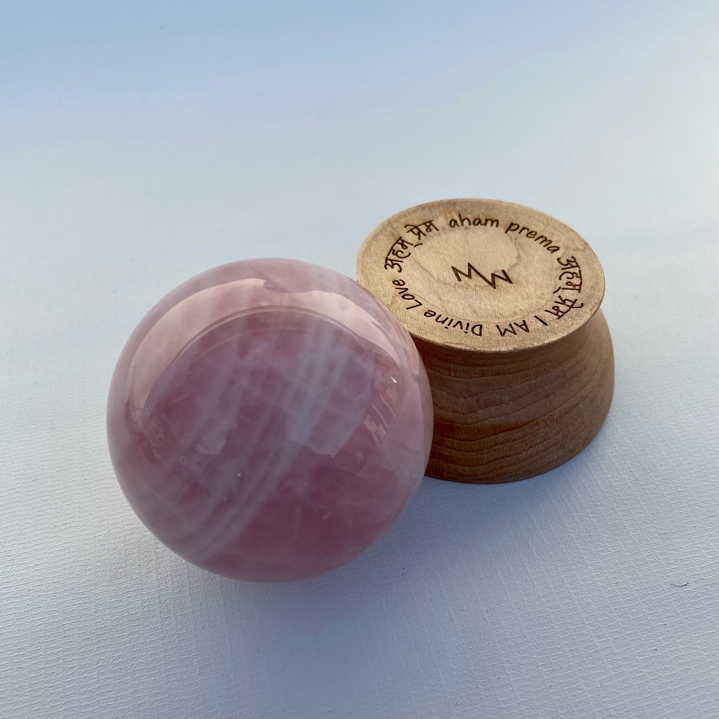 Rose Quartz Sphere with Tensor Ring Maple Wood Stand